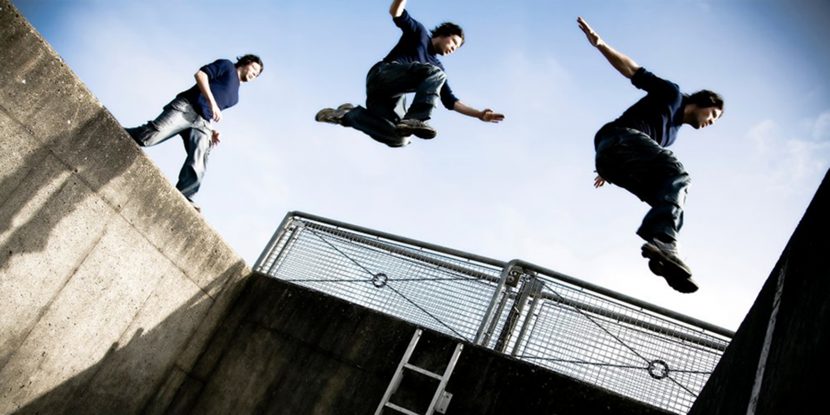 Adolescents performing parkour