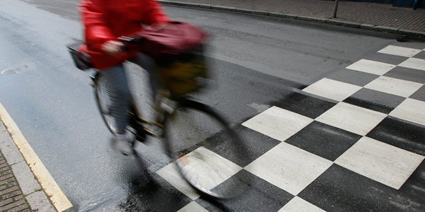 Anonymous cyklist in the street.