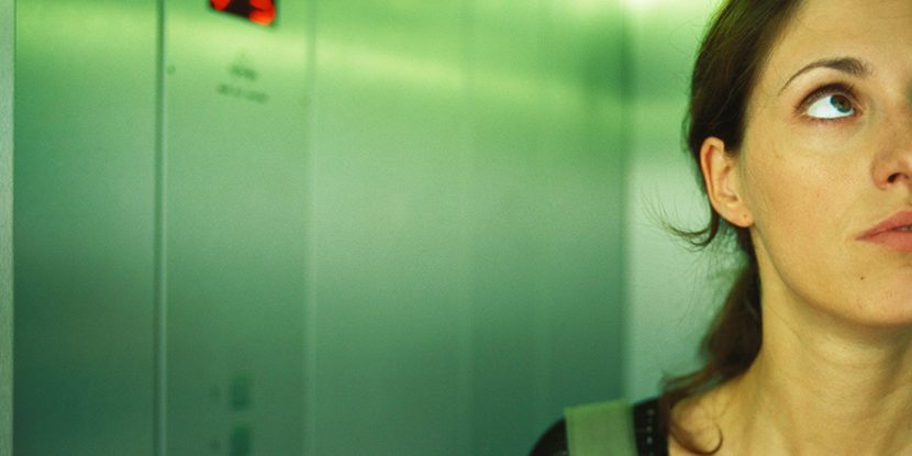 Young woman in an elevator