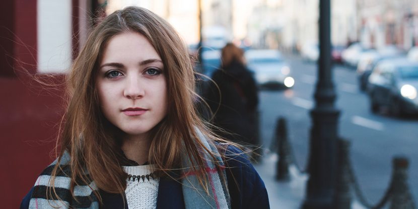Young woman outside in street. Photo: colourbox.com