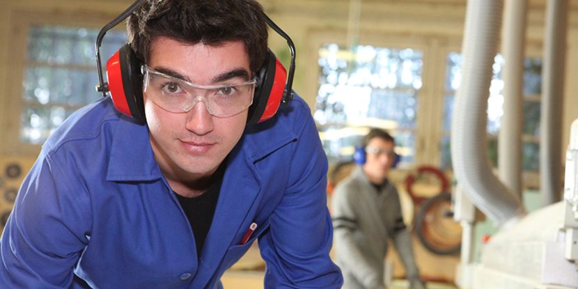 apprentice working in a factory