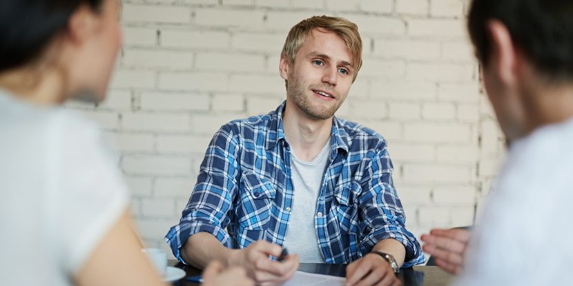 A young man at a job interview